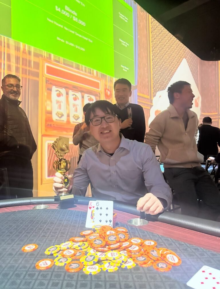 Poker tournament winner celebrating at a corporate casino event