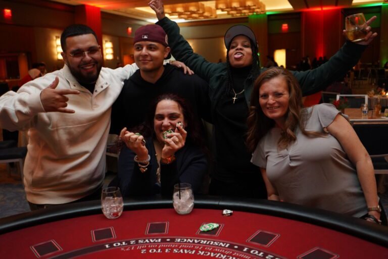 Casino-themed corporate holiday party hosted by Down to the Felt