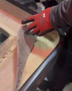 Shuffleboard restoration and refelting during the game room relocation